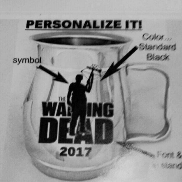 A collectible mug with the Walking Dead logo on it.