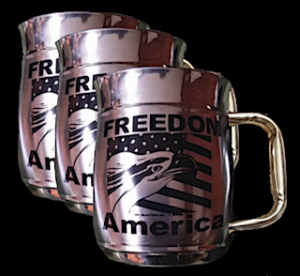 Three copper mugs with the words freedom america on them.