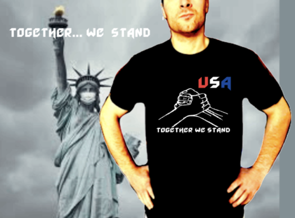 A man wearing a Shop| Men's & Women's Custom Designed T-Shirts & Tanks with the words "Join the Movement" stands in front of the Statue of Liberty.